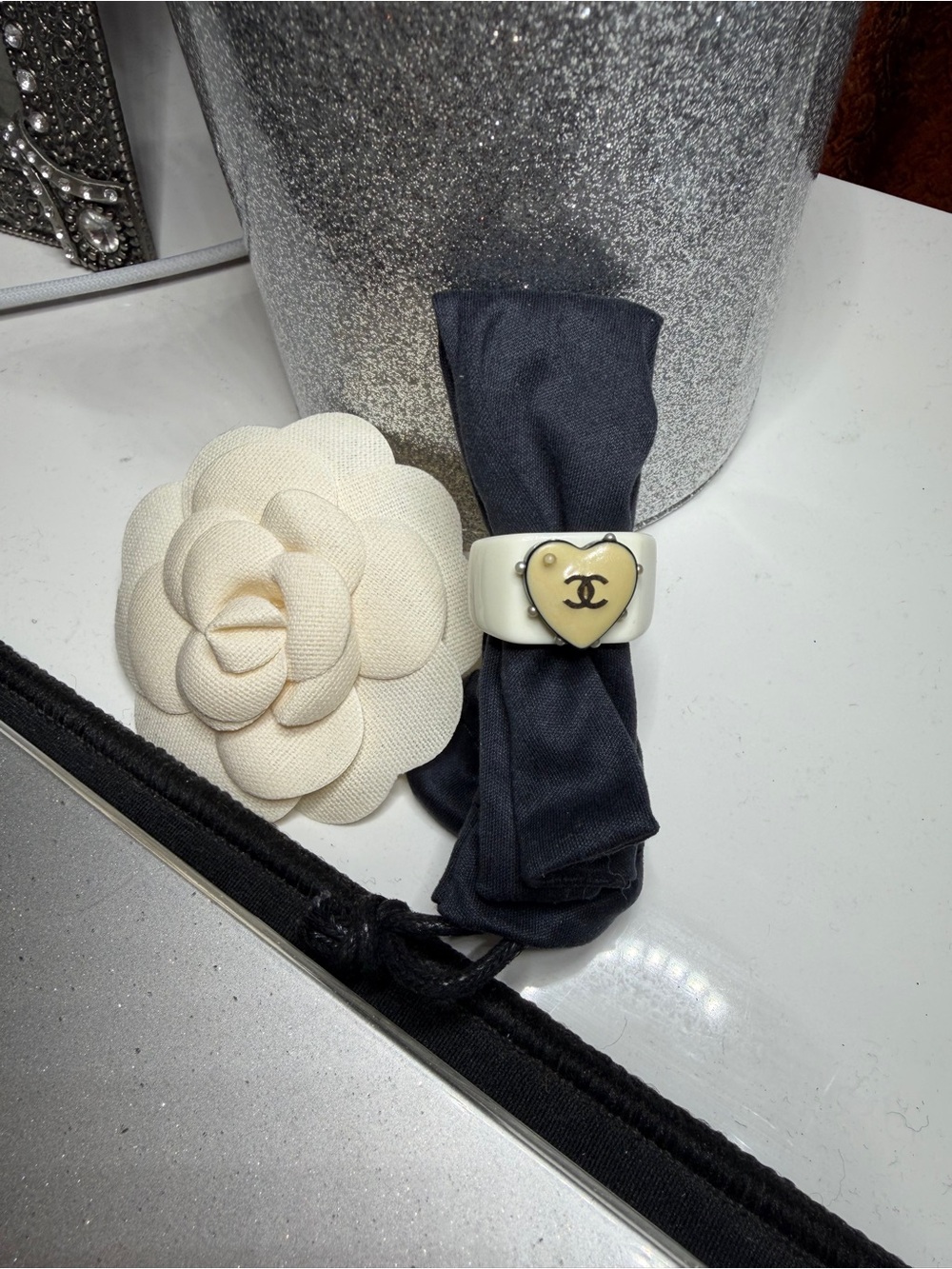 CHANEL Vintage Black Resin Ring with Ivory Heart Camellia Accent